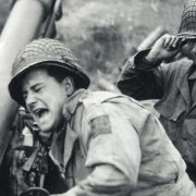 How did soldiers handle the noise of combat during the World Wars?